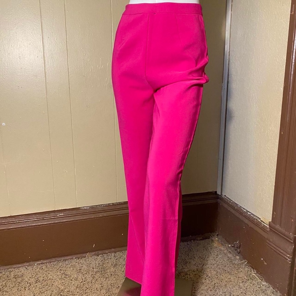 Pink flared leg pants , Size X-small . Great condition